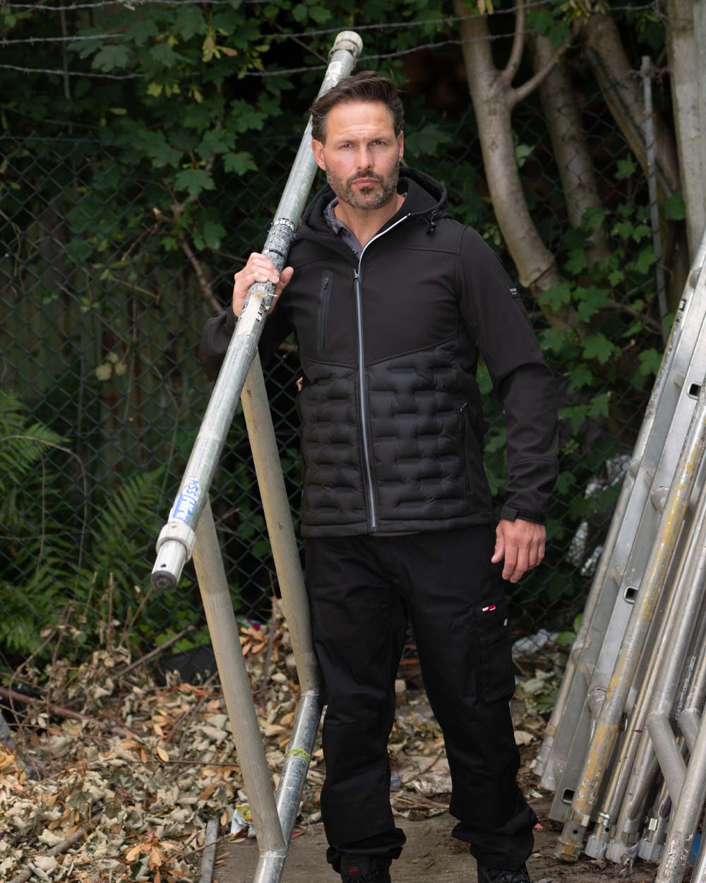 Black TuffStuff Stratford Softshell Jacket on Garden Background 